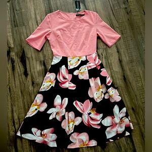 Pink, multicolored lower half dress with back zip.